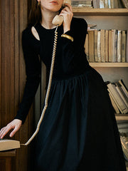 Derpai Schwarzes langes Kleid im Trapezstil mit Cut-Outs & langen Ärmeln